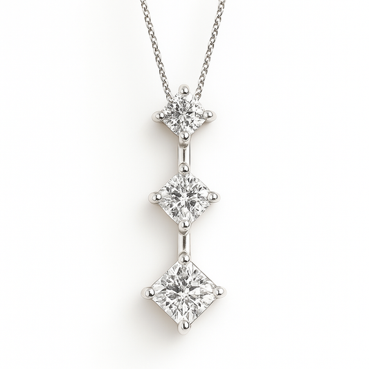 14K White Gold Pendant with 3 Princess Cut Diamonds in a Single Row. TDW: 0.97ct SI 1 – 2 GH