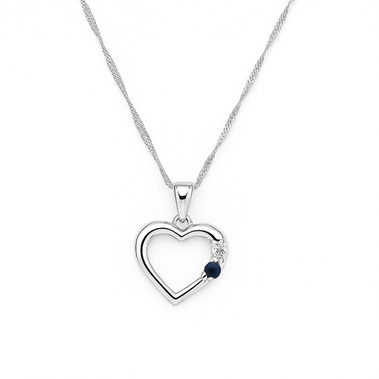 White Gold Chain and Heart Pendant setting with one Diamond and a Sapphire, 10k
