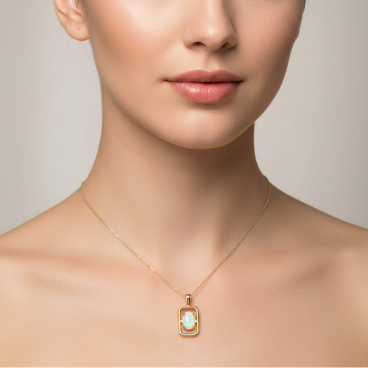 14K Yellow Gold Oval Opal Solitaire Necklace in a Rectangular Open Frame Design O:0.22ct