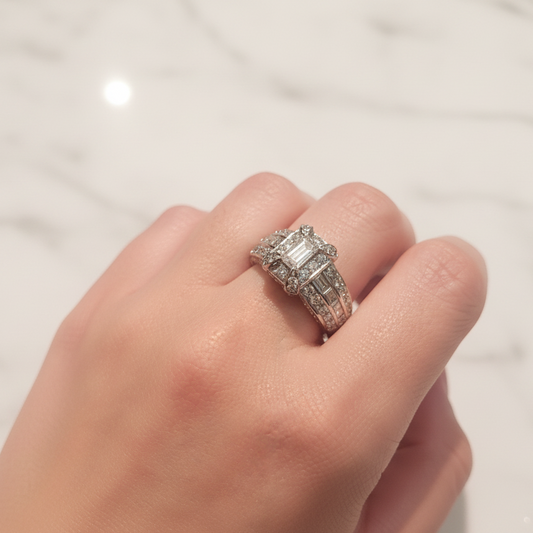 18K White Gold Classic Diamond Ring with Emerald Cut Baguettes and Round Diamonds. TDW: 2.50ct VS FG