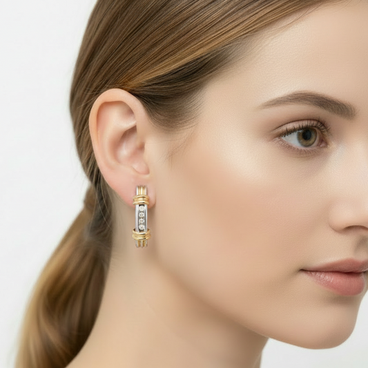 14K Two – tone White and Yellow Gold Lever Back Diamond Earrings. TDW: 0.20ct