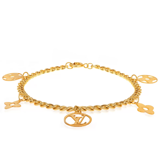 Yellow Gold Station Charm Bracelet.