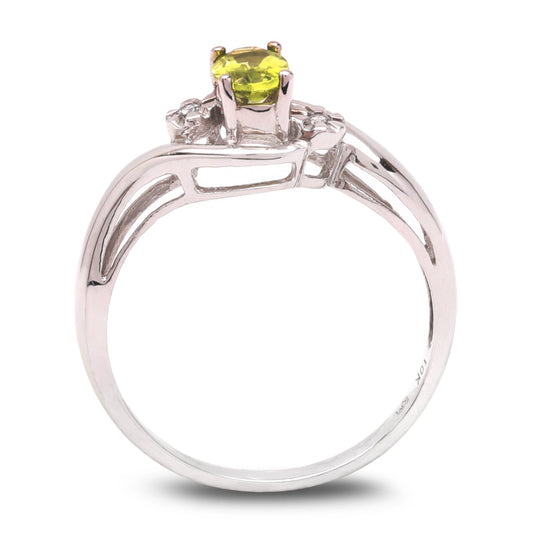 White Gold Oval Peridot and Diamond Ring. 10k, P: 0.40ct, TDW: 0.02ct