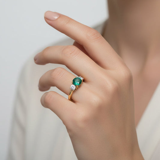 18k Yellow Gold Oval Shape Emerald and Forevermark Diamond Ring.