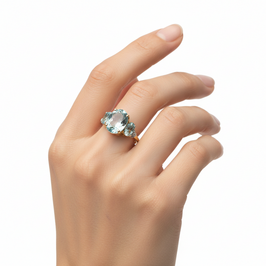 10K Yellow Gold Ring with Three Blue Topaz and Diamonds, T: 2.78ct