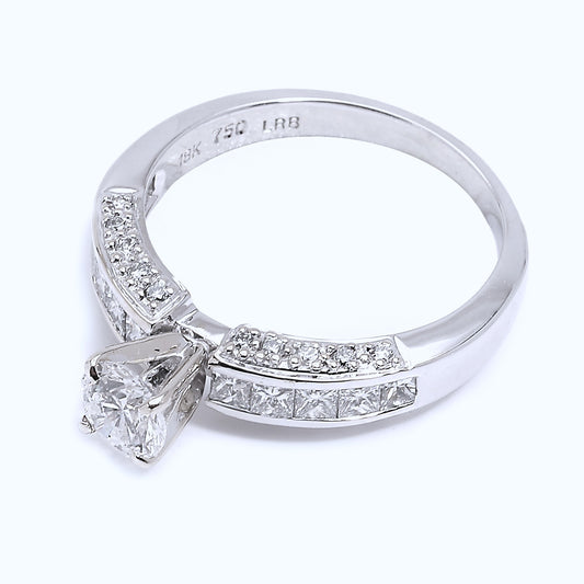 Sleek Solitaire Ring with Channel-Set Princess Diamonds.18k, Centre Stone: 0.50ct, SI1, F, TDW: 1.24ct