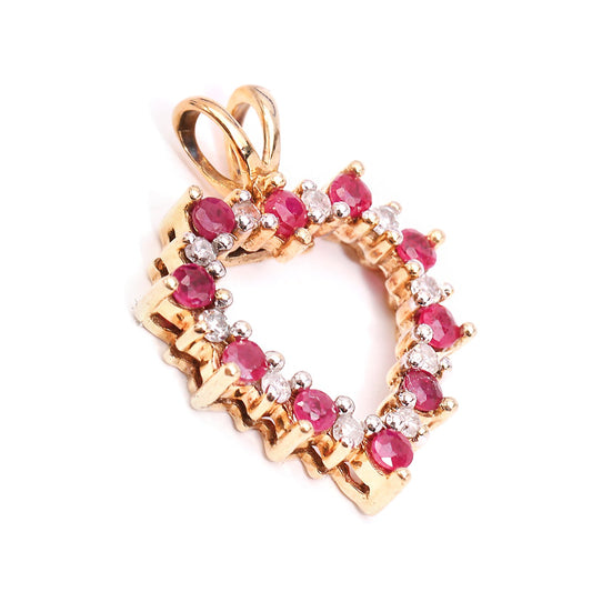 Yellow Gold Heart Shape Diamond and Ruby Pendant. 10k, R: 0.2ct, TDW: 0.07ct