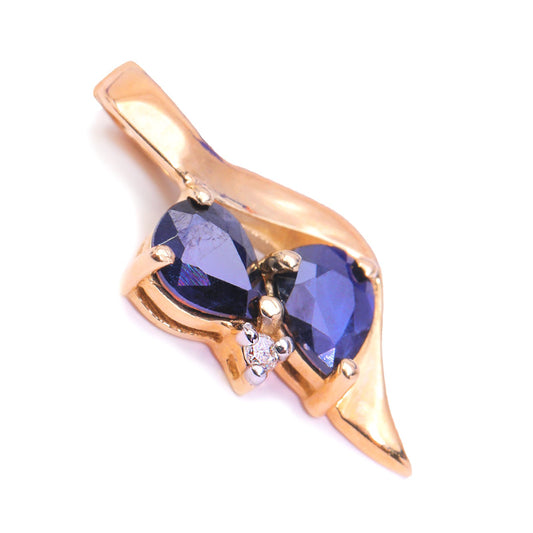 Yellow Gold pendent setting with two Pear Shape Sapphire and one Diamond, 10k