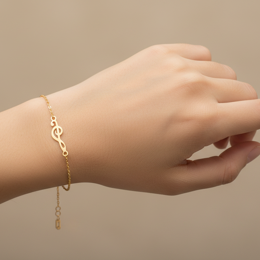 18K Yellow Gold Chain Bracelet setting with Treble Clef
