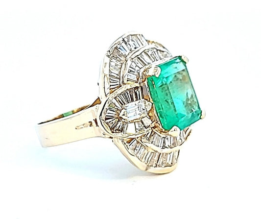 Yellow Gold Massive Square Cut Faceted Natural Emerald and Baguette Diamond Ring. E: 10.6x10.37x8.5mm 5.95ct.  TDW: 2.89ct SI GH