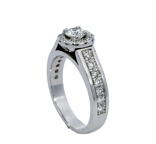 White Gold Halo Engagement Diamond Ring. Centre Stone: Round Diamond 0.4ct. Centre Stone is Surrounded with 12 Round Diamonds. 14 Diamonds on Shanks. TDW: 0.9ct. VS2-SI1 GH 14k 5.2gr