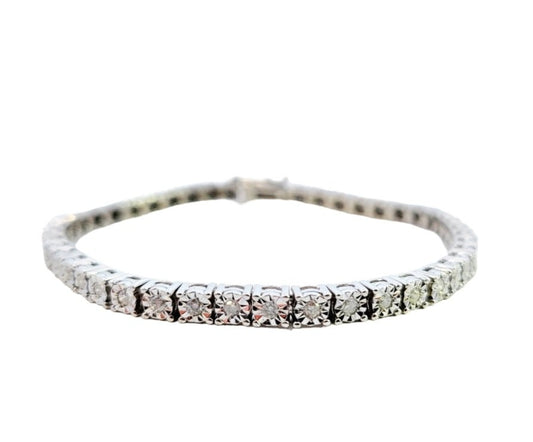 White Gold Illusion set Diamond Tennis Bracelet. 10K, 11.3gr, 46 RoundDiamonds. I, I-J, TDW: 1.15ct