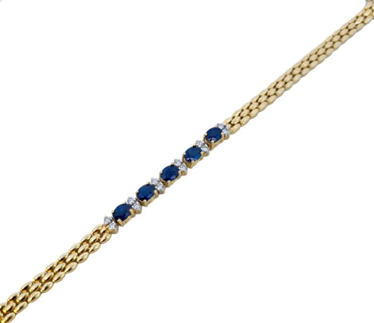 Yellow Gold Sapphire and Diamond Bracelet. 14k, 12.6ct., S: Oval, 5x4.3x2.5mm, 2ct., TDW: 0.24ct