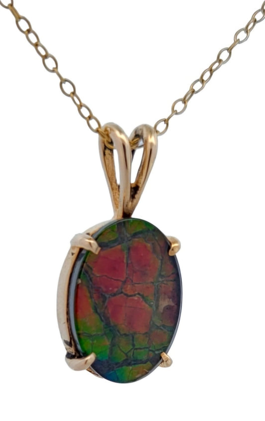 Yellow Gold Pendant setting with one Oval cut Fossil Ammolite. 2.9ct, 14k