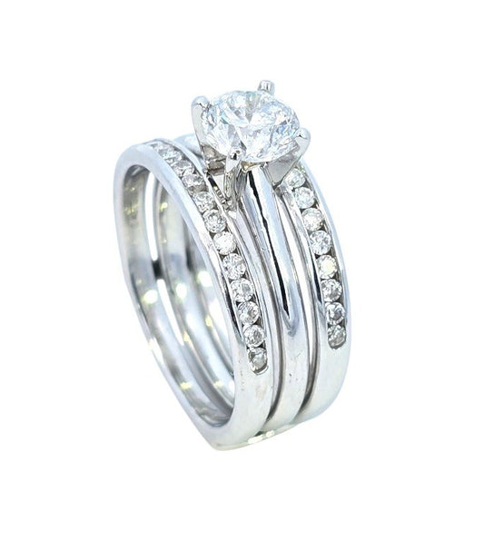 White Gold Solitaire Round Diamond Ring and Jacket Set. Centre: 1ct, I2, 14k, Jacket: TDW: 0.40ct. Set: TDW: 1.4ct, 7.7gr.