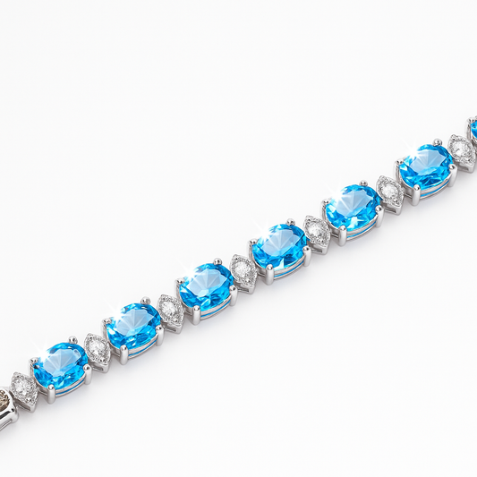 White Gold Blue Topaz and Diamond Bracelet. 18k, T: 13.5ct. TDW: 0.54ct, VS, FG