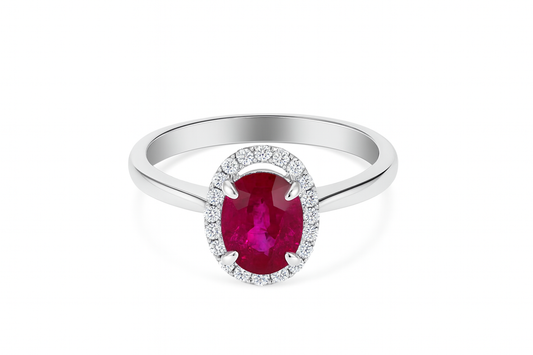 White Gold Halo Setting Oval Shape Ruby and Diamond Ring. 14k R: 1.14ct TDW: 0.11ct