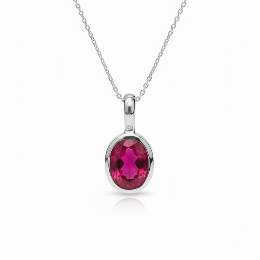 18K White Gold Oval Shape Enhanced Ruby Pendant. 1.40ct