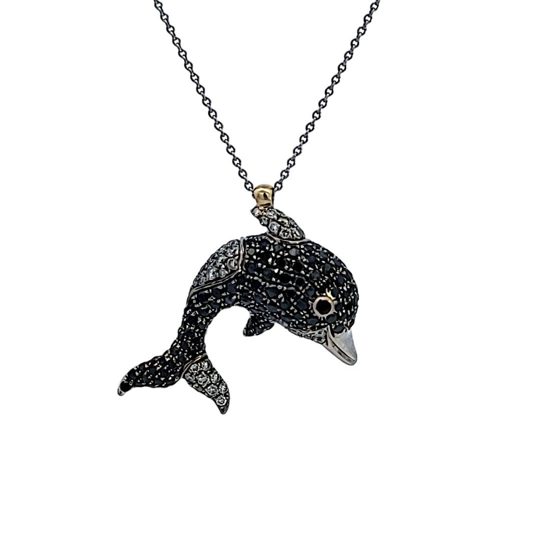 White Gold Dolphin Necklace With White and Black Diamonds Setting with 40 Round White Diamonds 111 Black Diamonds. and one Ruby for Eye. 18k 5.5gr TDW: 0.8ct
