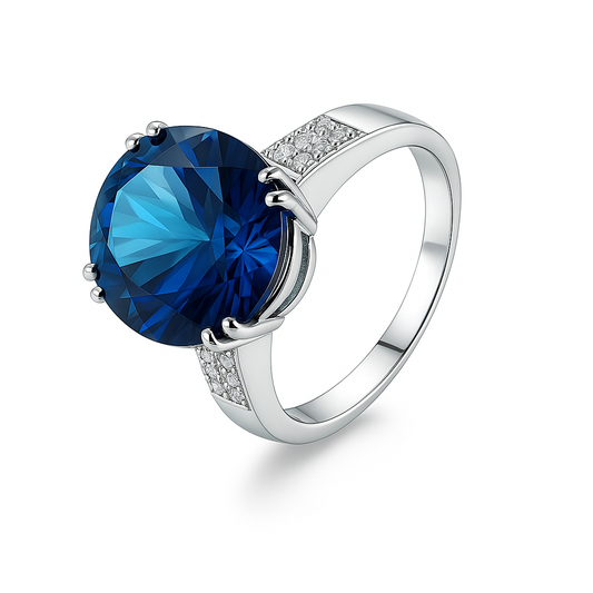 White Gold Ring setting with one Oval Shape Blue Topaz and Diamonds, 10k