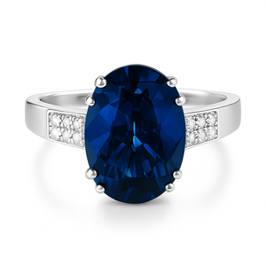 White Gold Ring setting with one Oval Shape Blue Topaz and Diamonds, 10k