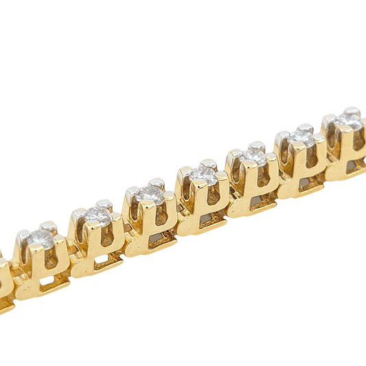14K Yellow Gold Tennis Bracelet. TDW: 1.56 SI GH