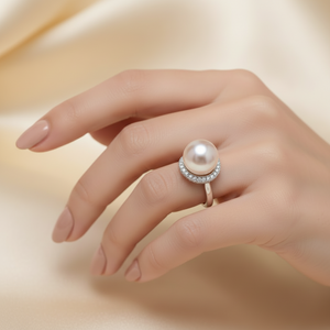 14K White Gold Ring with Heart Shape design setting with one Freshwater Pearl and Diamonds Pearl : 9.9mm Freshwater. Set with 35 Natural Round Diamonds TDW: 0.25ct GH SI