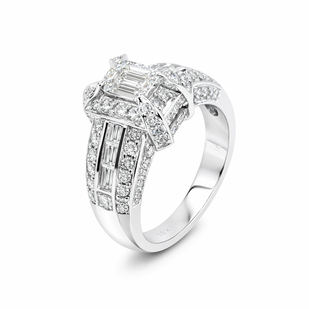 18K White Gold Classic Diamond Ring with Emerald Cut Baguettes and Round Diamonds. TDW: 2.50ct VS FG