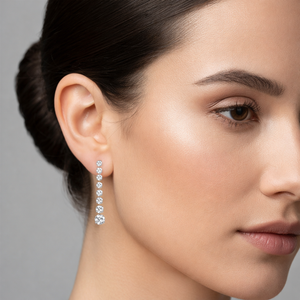 10K White Gold Drop Diamond Earrings. TDW:0.70ct G SI