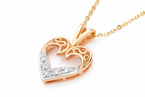 10K Yellow Gold Heart Pendent set with 5 Round Diamond TDW: 0.05ct SI H