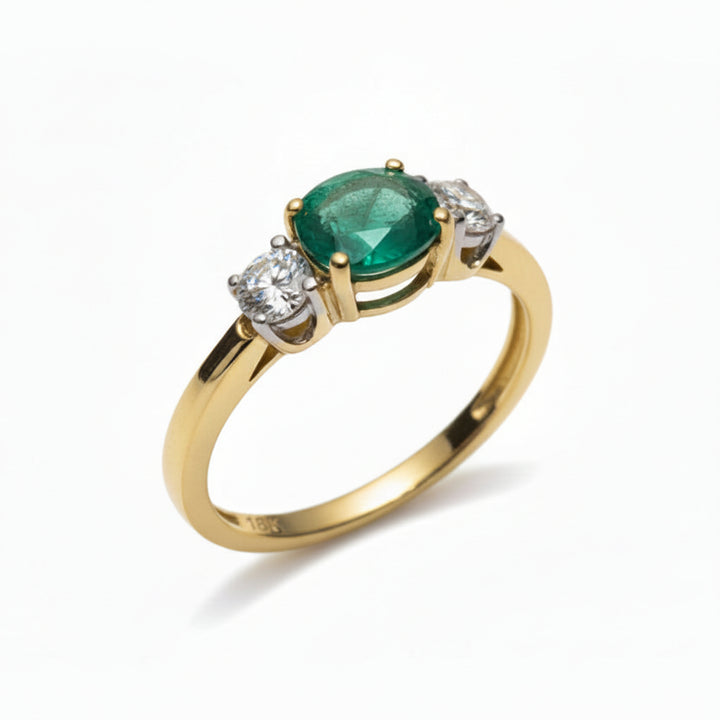 18k Yellow Gold Oval Shape Emerald and Forevermark Diamond Ring.