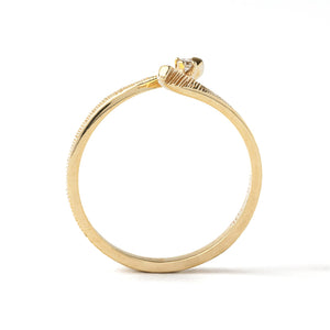 10K Yellow Gold Ring with Diamond in the middle TDW: 0.01ct size 6 1/2
