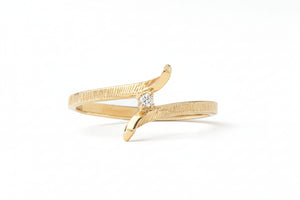 10K Yellow Gold Ring with Diamond in the middle TDW: 0.01ct size 6 1/2