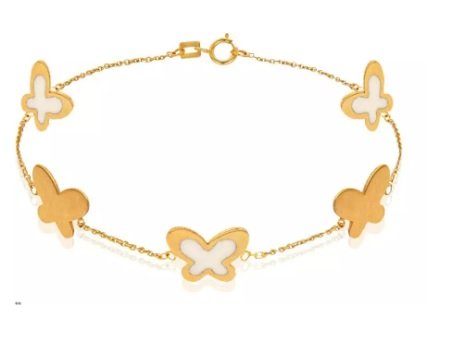 Yellow gold butterfly bracelet station style with white enamel 7 to 7 1/2 inches 18k 2.81gr