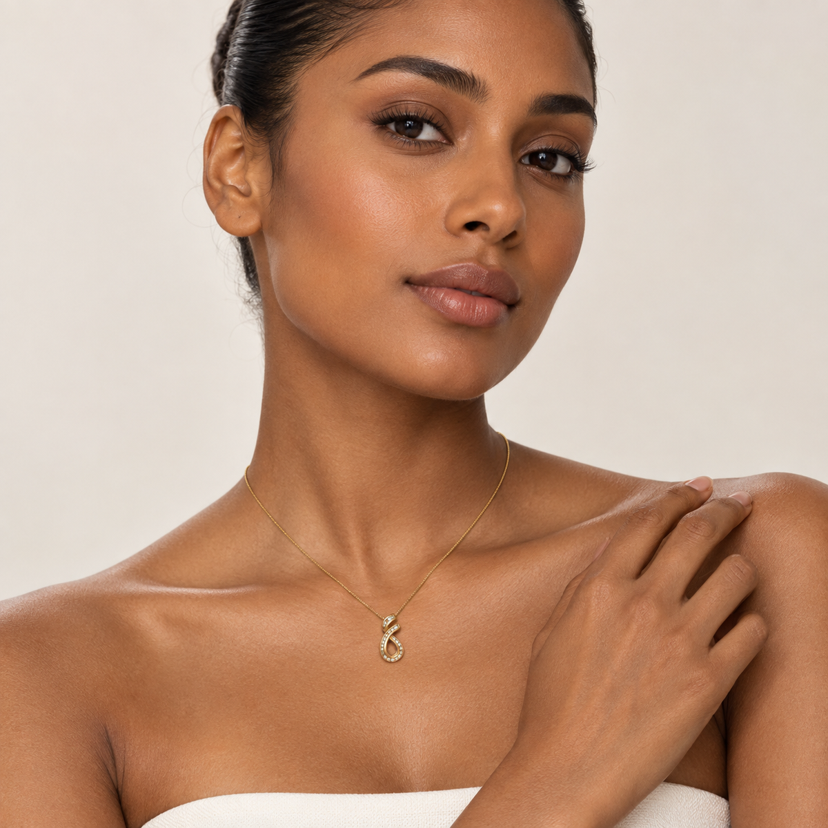 Vintage 18K Yellow Gold Diamond Swirl Teardrop Pendant Necklace 0.30ct - worn, editorial portrait