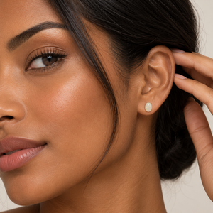 14K Yellow Gold Natural Opal Stud Earrings - worn on model, ear close-up