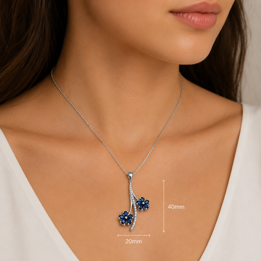 18k White Gold Floral Design Sapphire and Diamond Pendant.