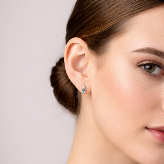 14k White Gold Oval Cut Blue Topaz and Diamond Stud Earrings