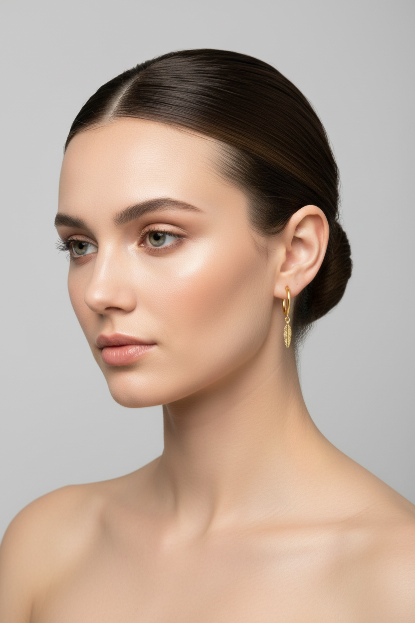 18K Yellow Gold Huggies with hanging Feather 2.39gr