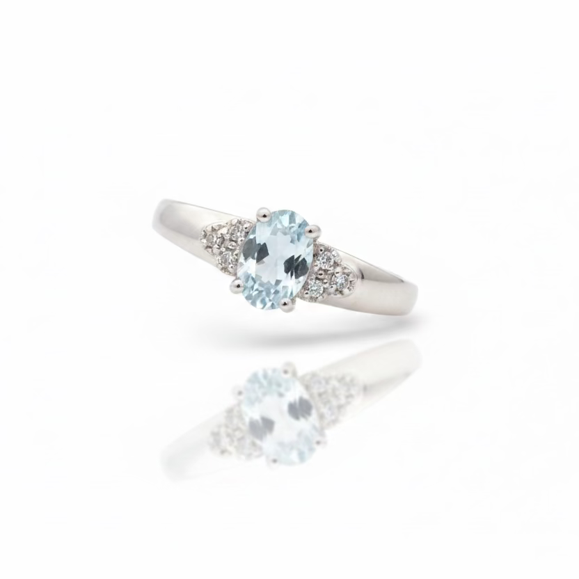 10K White Gold Oval-Cut Blue Topaz Ring with Pavé Diamond Accents