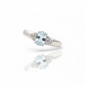 10K White Gold Oval-Cut Blue Topaz Ring with Pavé Diamond Accents