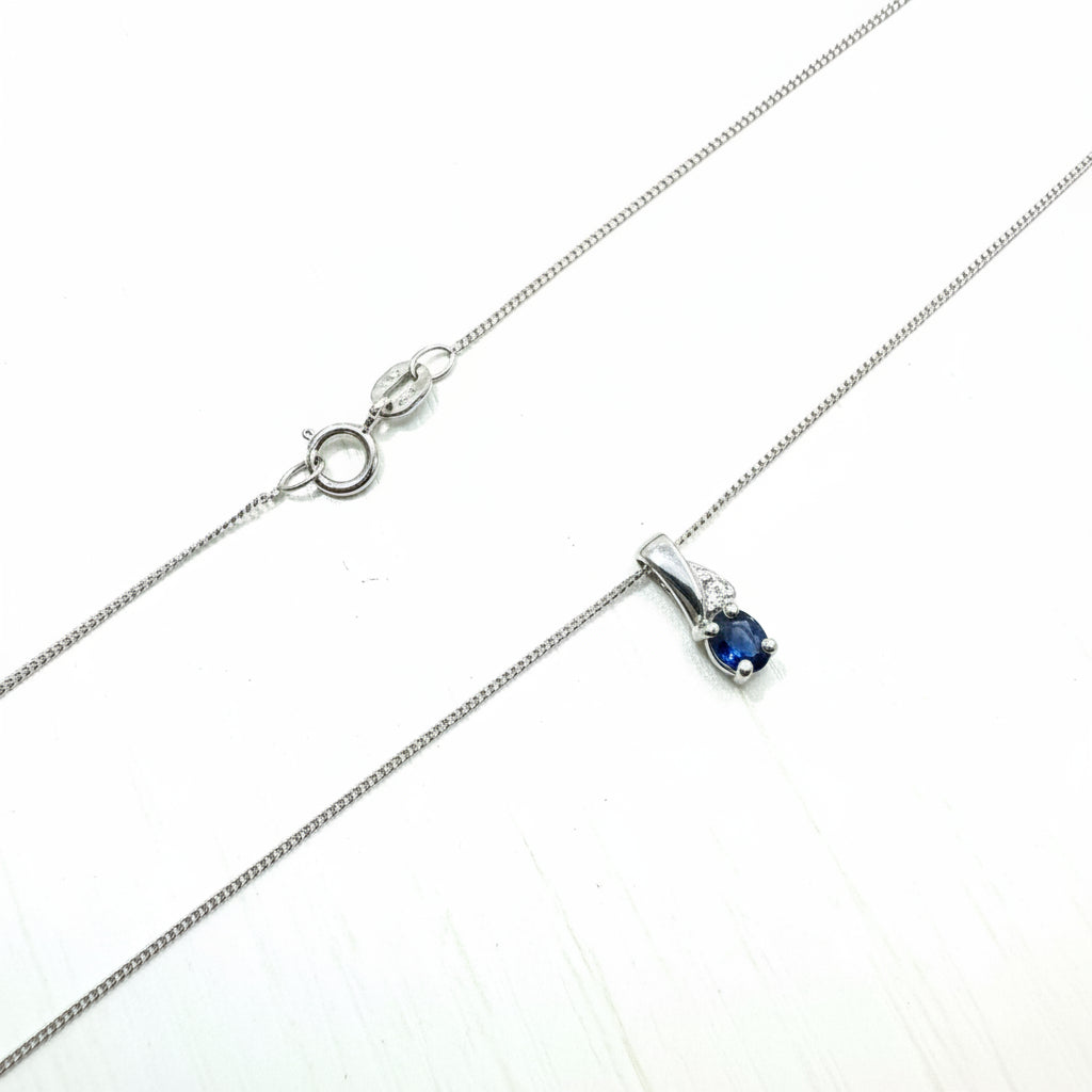 10k White Gold  Diamond and Oval shaped Sapphire Pendant Necklace