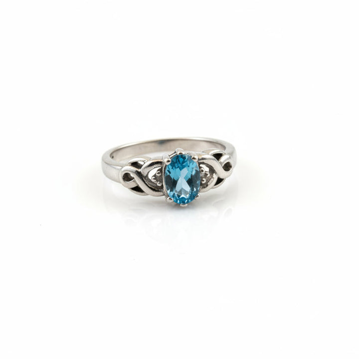 925 Sterling Silver Blue Topaz and White Cubic Zirconia Ring