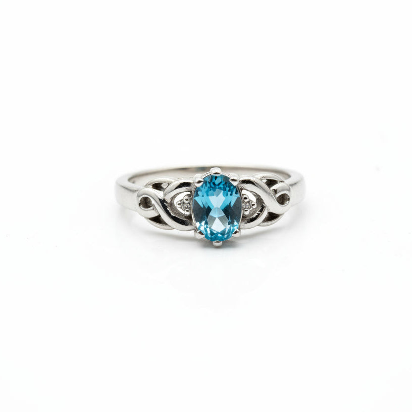 925 Sterling Silver Blue Topaz and White Cubic Zirconia Ring