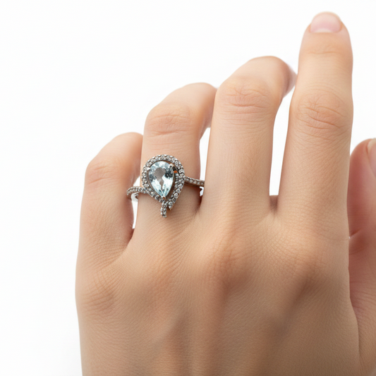 925 Sterling Silver Teardrop Blue Topaz and White Cubic Zirconia Ring