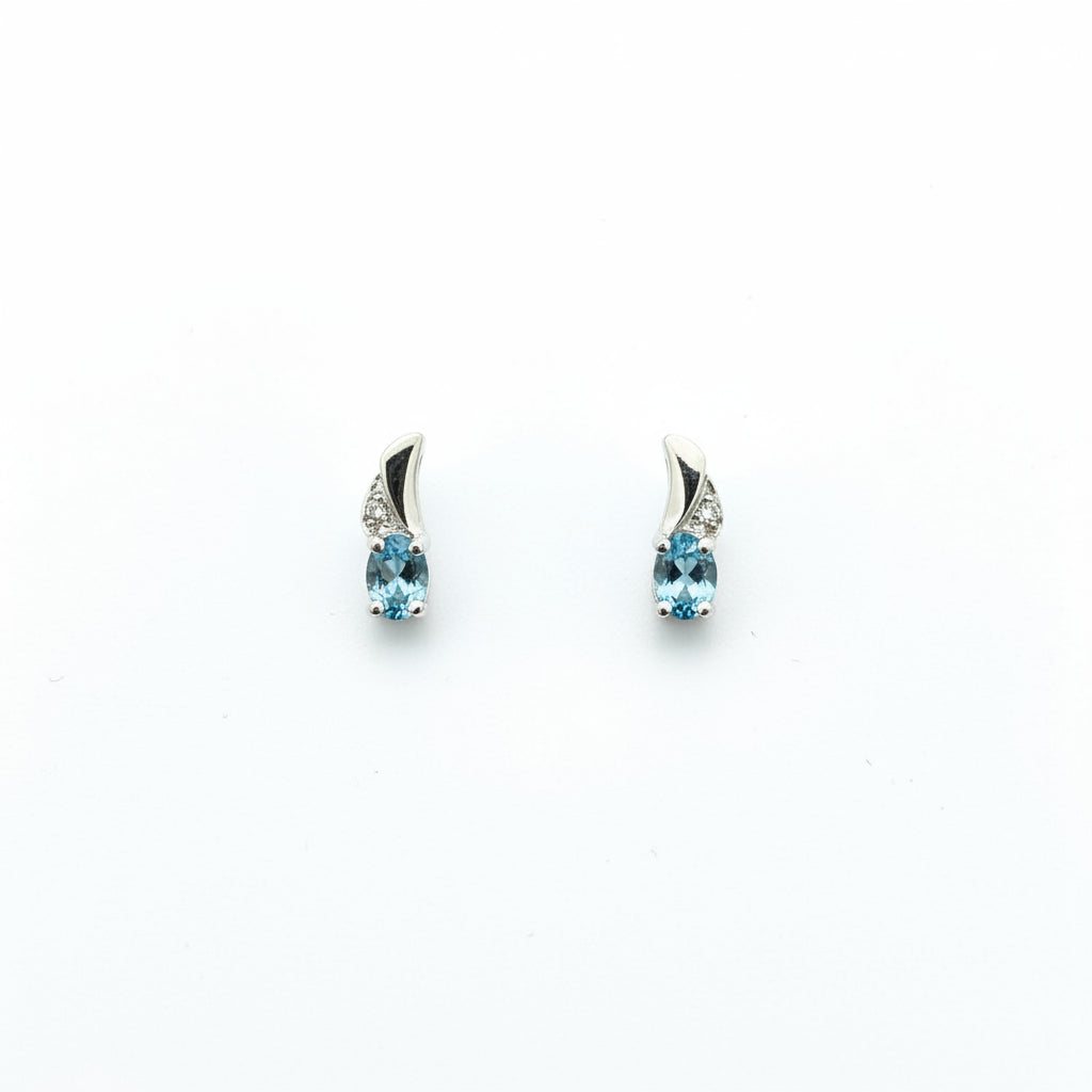 14k White Gold Oval Cut Blue Topaz and Diamond Stud Earrings