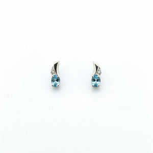 14k White Gold Oval Cut Blue Topaz and Diamond Stud Earrings