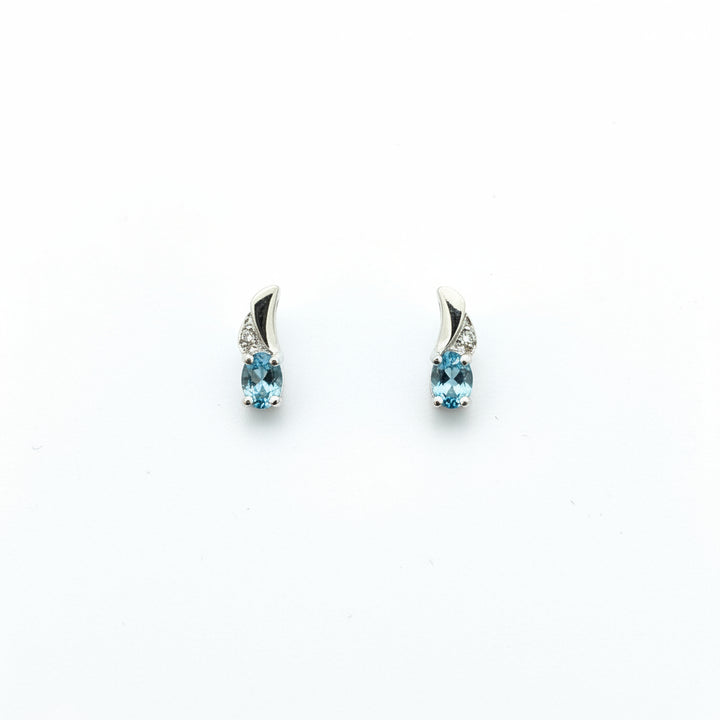 14k White Gold Oval Cut Blue Topaz and Diamond Stud Earrings