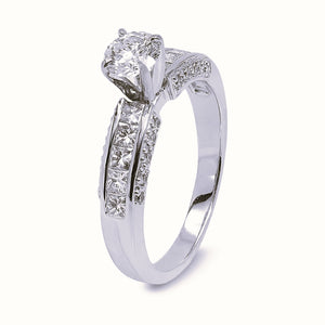 18K Sleek Solitaire Ring with Channel – Set Princess Diamonds. Centre Stone: 0.50ct SI1 F TDW: 1.24ct