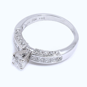 18K Sleek Solitaire Ring with Channel – Set Princess Diamonds. Centre Stone: 0.50ct SI1 F TDW: 1.24ct